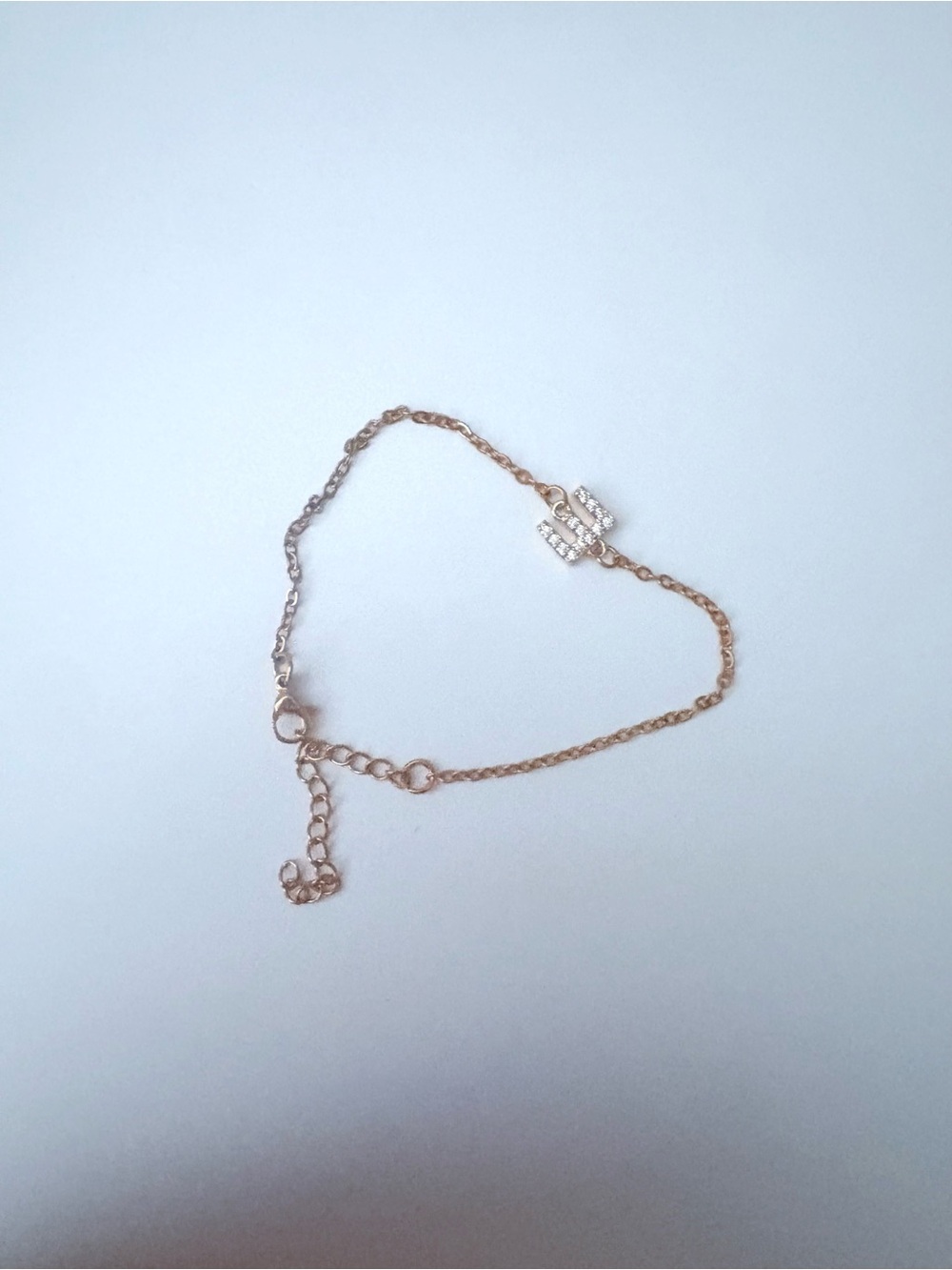 E initial Delicate Gold-Tone Chain Bracelet with Crystal Cross Accent